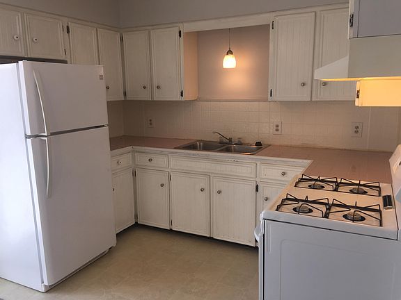Plenty of cabinet space! There is also a walk-out off the kitchen out to back yard.