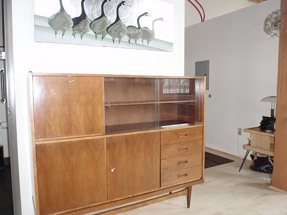 INVITING FOYER with coat closet has wall space for a hutch. DSL & T1 technology in unit.