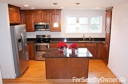 Kitchen
						:
						All new stainless appliances,granite and new cabinets. Opens to dining area