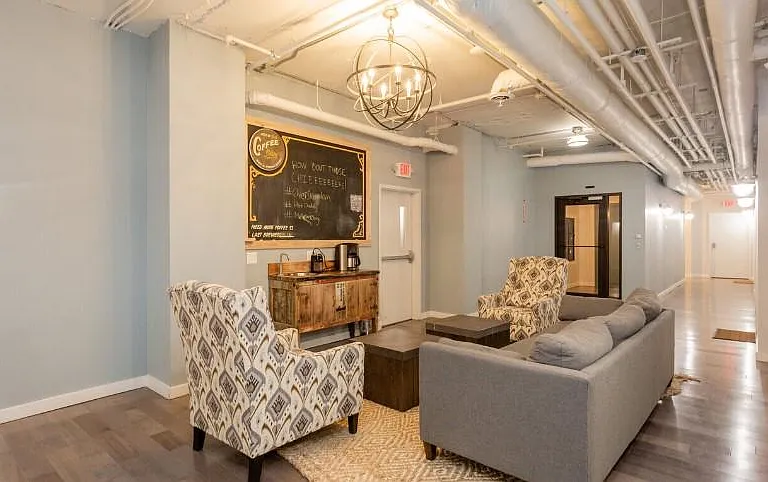 Free locally roasted coffee is provided in the 4th floor coffee lounge.