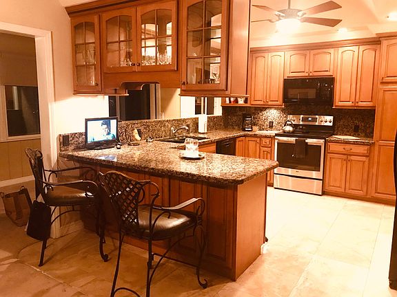 Updated kitchen with marble floors