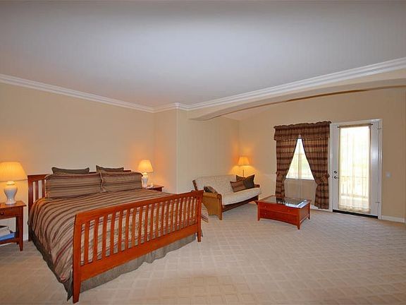 Expansive Master Suite with Sitting Area and Balcony To Enjoy The Amazing View