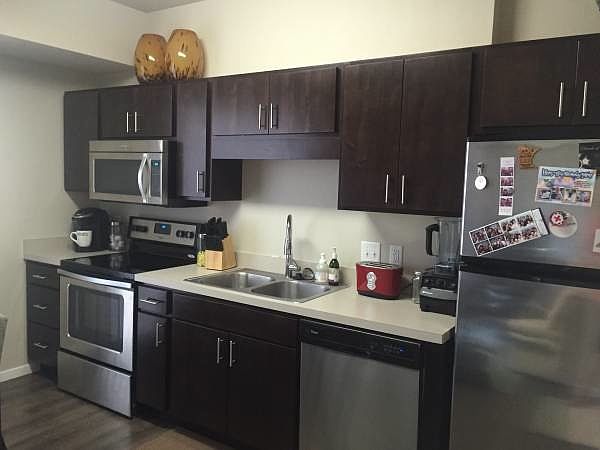 Kitchen with new hardwood cabinets and stainless steel appli