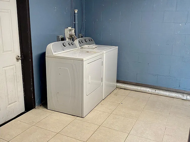 Downstairs laundry room includes W/D hookups and W/D. If broken, owner is not responsible and tenant may bring in their own W/D