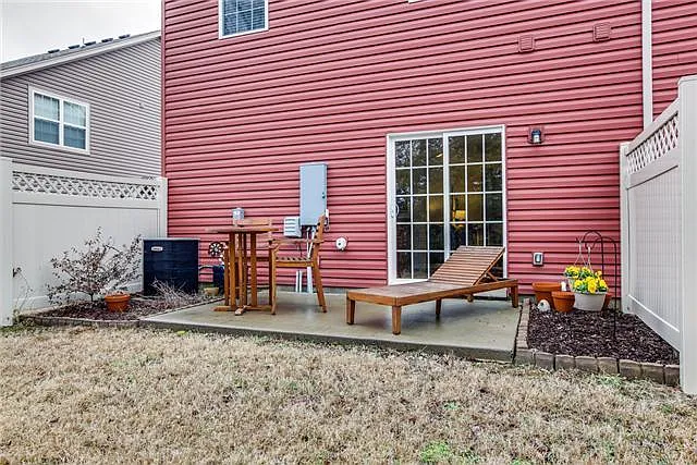 Back of house with Backyard