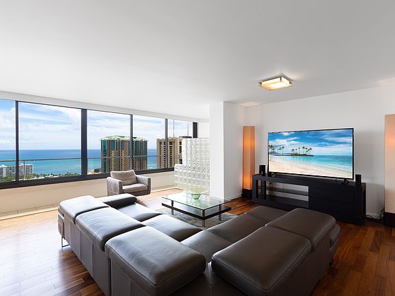 Luxury living room seating with gorgeous ocean views overlooking Waikiki
