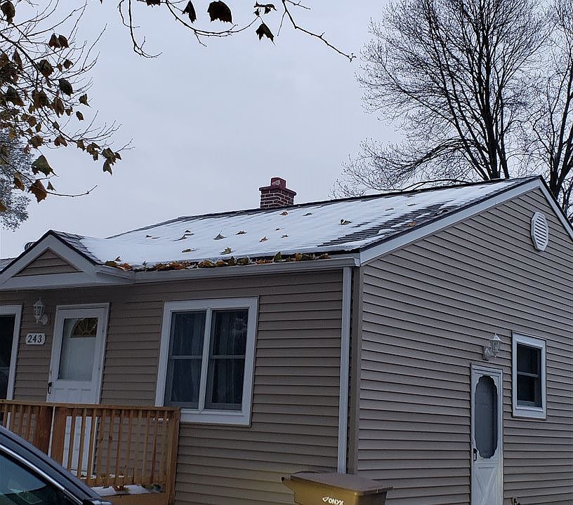 FRONT/SIDE OF HOUSE.