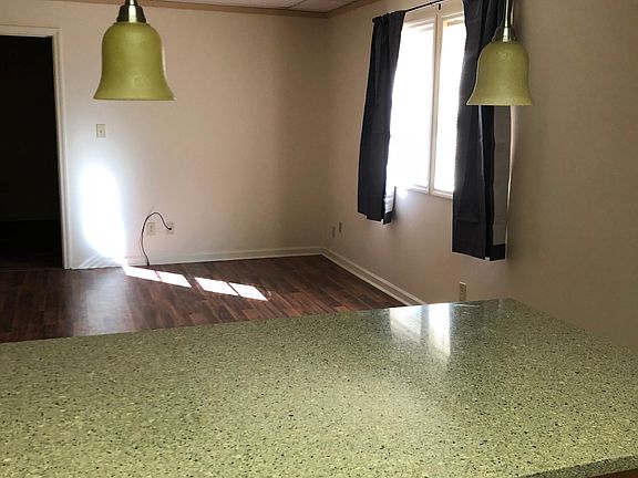 Spacious living room looking from the kitchen