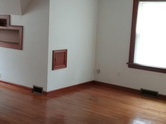 Living room with alcove.