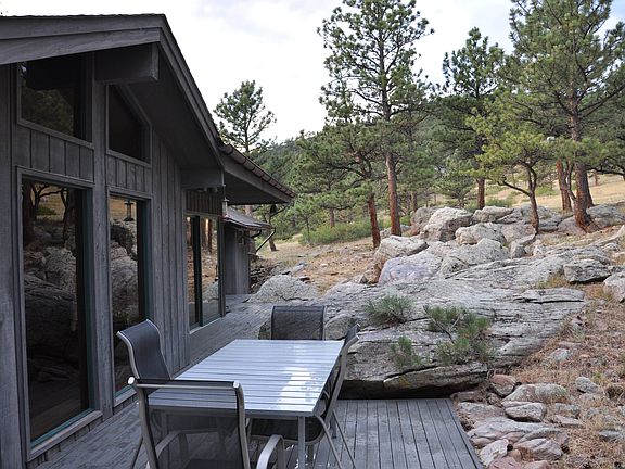 Backyard Deck and Natural Rock Formation