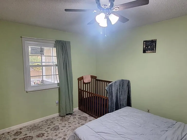6567 NE Montrose Trl — Photo 9