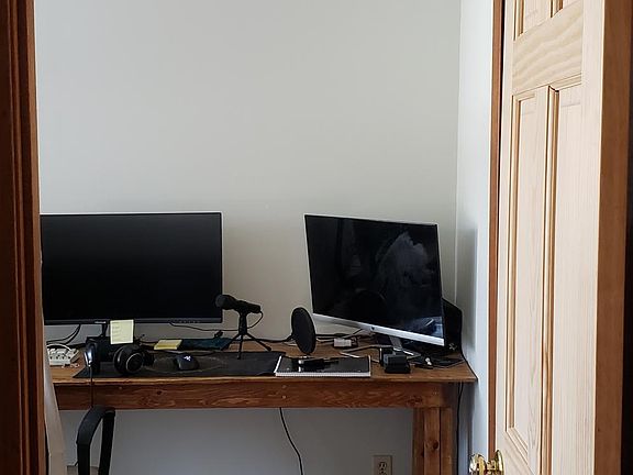 Entry to larger bedroom