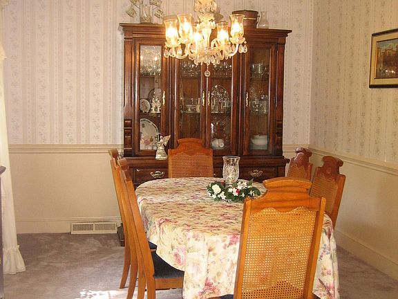 Formal Dining Room with Bay window and Chair Railing