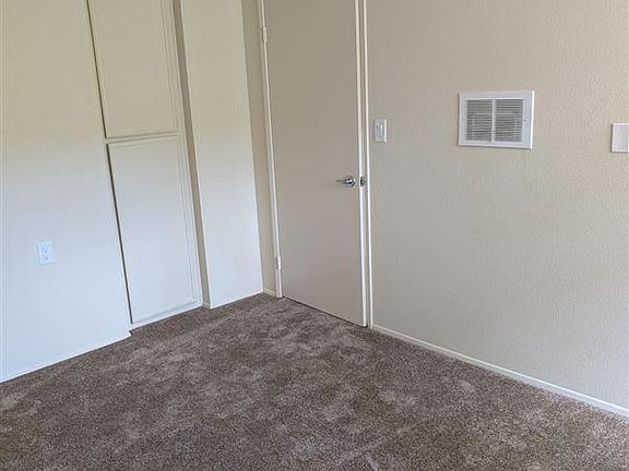 Generously sized bedroom offers plenty of space for rest. Another nice size closet and cabinets offering plenty of space for personalization.