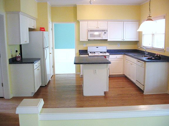 Hardwood Floors, Solid Surface Countertops, and Pantry 