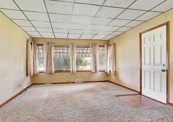 Living room (Will likely be replacing the flooring and updating pictures later)