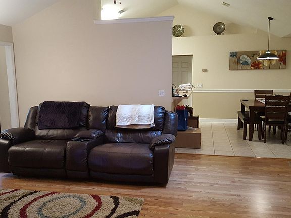 Living room. Dinning room viewable through the foyer door