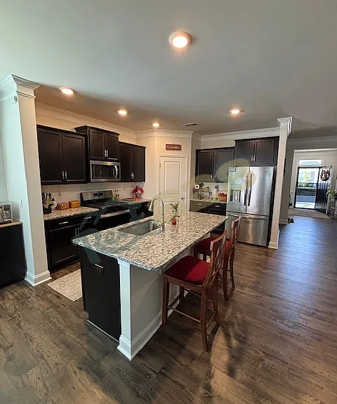 full kitchen with gas oven/range, fridge, microwave and dishwasher