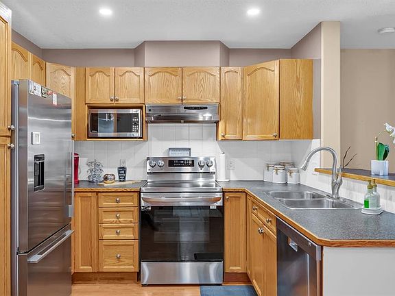 2nd image of 728 W Country Hills Rd NW #106