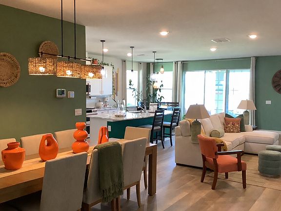 "Bright open-concept living and dining with natural light throughout"