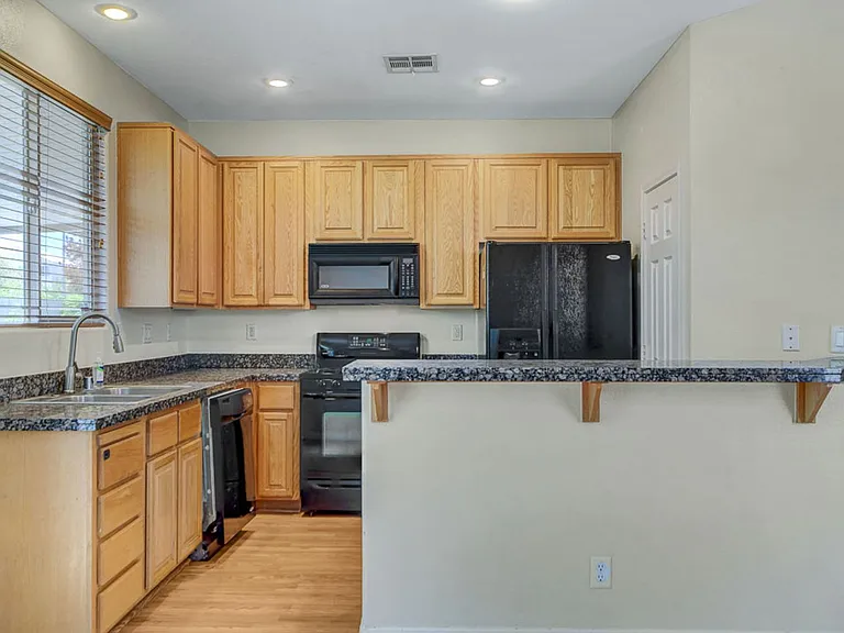 8737 Radiant Ruby Ave — Photo 18