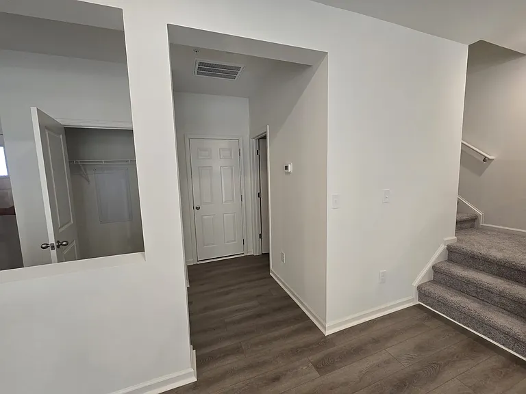 Door to the right for half bath, door to the left for garage