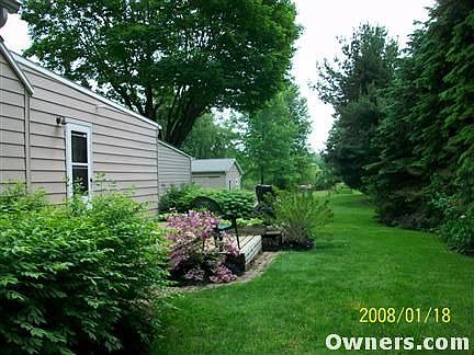 PRIVATE SIDE PORCH AND YARD