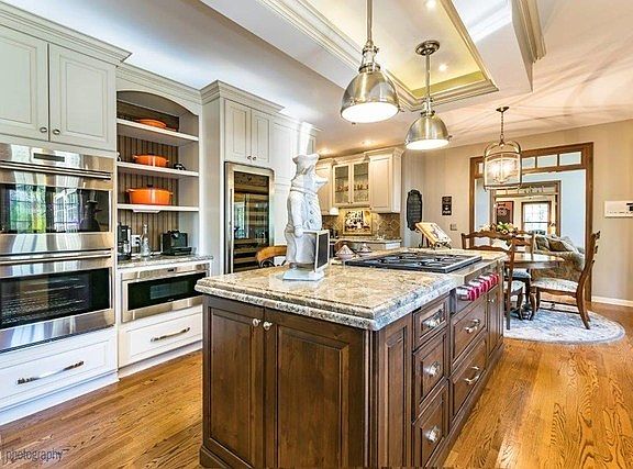 STUNNING NEW KITCHEN WITH HIGH END WOLF, BOSCH, SUBZERO APPLIANCES, GRANITE COUNTERS & A 155 BOTTLE WINE REFRIGERATOR