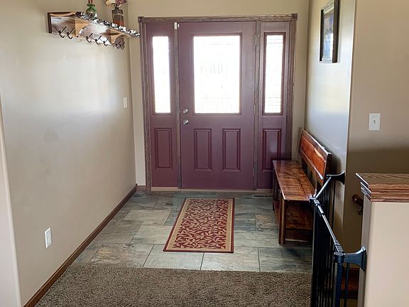 5th image of 2460 E 95th St