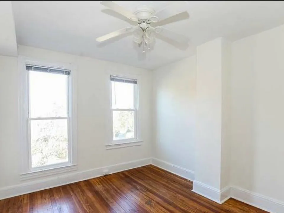 Bedroom has closet, 2 windows and can fit a Queen sized bed and desk comfortably. Wall mounted flat screen television comes with the room.