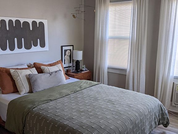 Bedroom with walk-in closet
