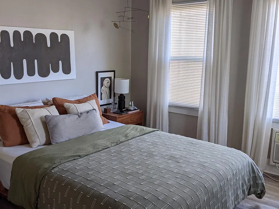 Bedroom with walk-in closet