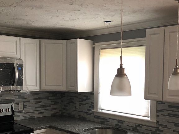 New kit cabinets and granite