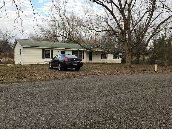 Black walnut tree in front