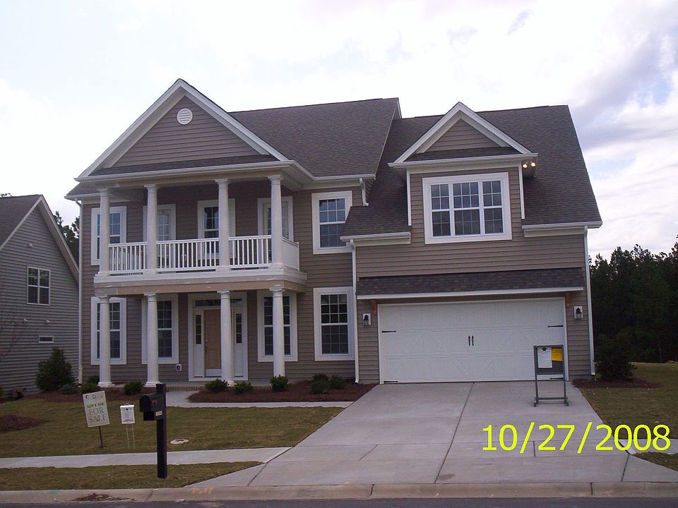 Backs up to the walking trails, great location.  Guest suite/study on main lev