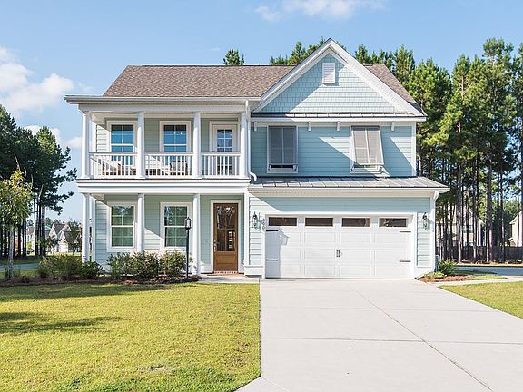 Photos are of a similar home