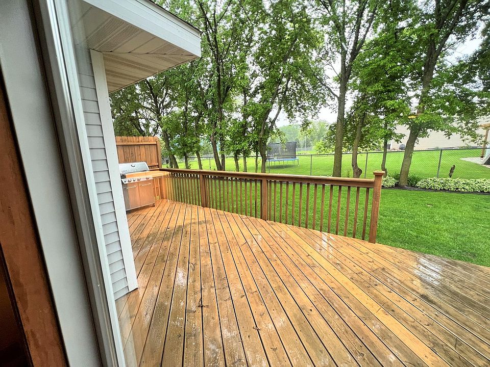 Large, private wood deck and grass yard