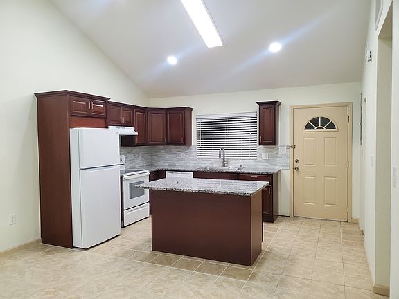 Kitchen and house entrance.