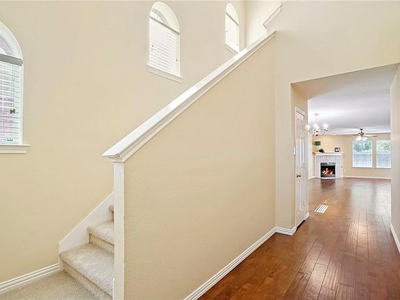 Wood floors continue from the entry to the back door!