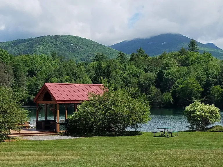 View of the lake and outdoor grilling station