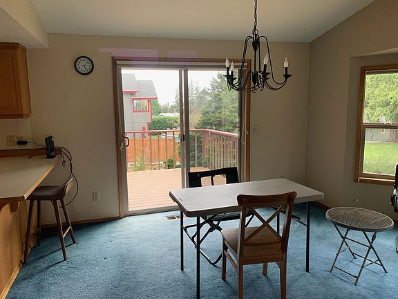Dining area, with deck access.