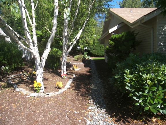 Note the easy care landscaping at the left side of the property.