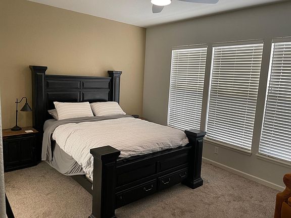 Primary Suite with en suite and spacious walk-in closet.