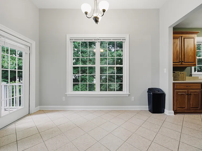 Dining room with door to balcony