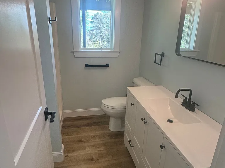View i to bathroom. Vanity with quartz top