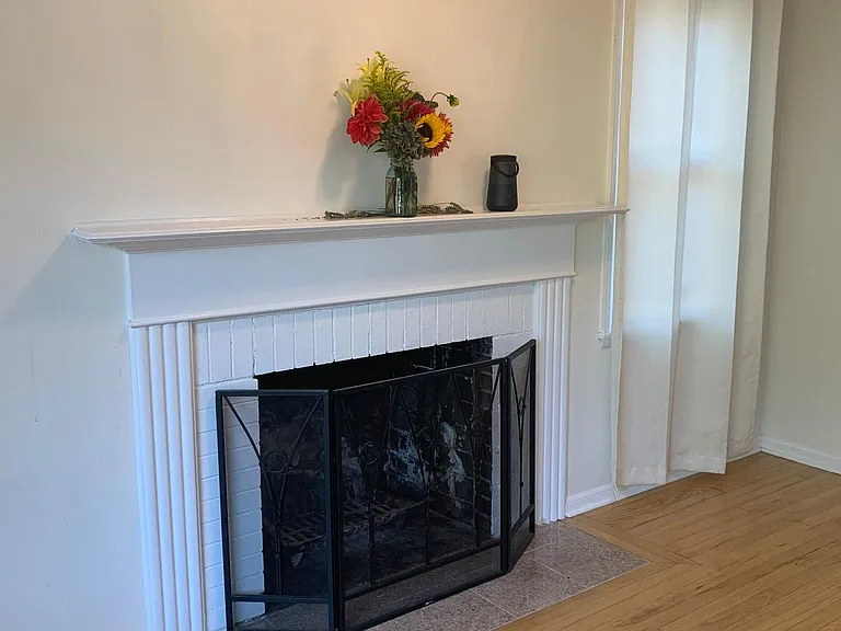 Wood buring fireplace and hardwood floors throughout first floor.