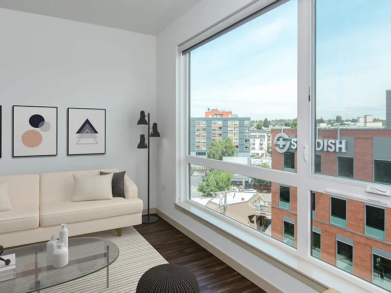 Living Room with Hardwood Floors and Floor-to-Ceiling Windows