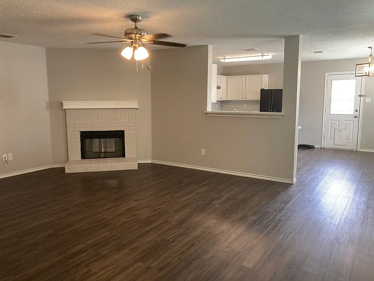 Wood burning fireplace in Great Room.