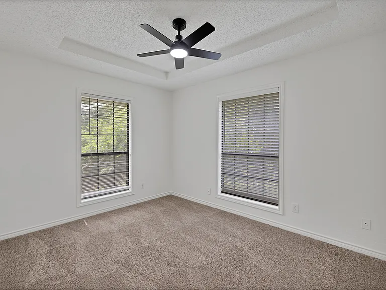 One of the three upstairs bedrooms.