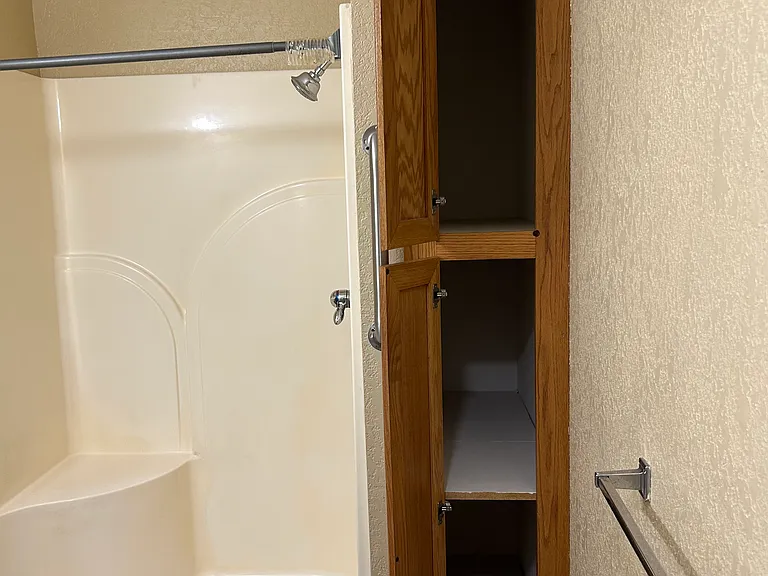 1 3/4 bath shower and storage